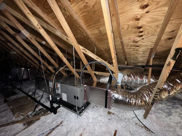 Attic air handler & flex duct — Horizontal unit hung in the attic with new insulated flex runs (Wonder Air & Heat, Brevard County FL)