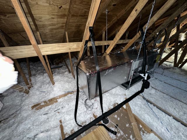 Suspended wrapped plenum — Foil-wrapped plenum hung level on all-thread — no attic sag (Wonder Air & Heat, Brevard County FL)