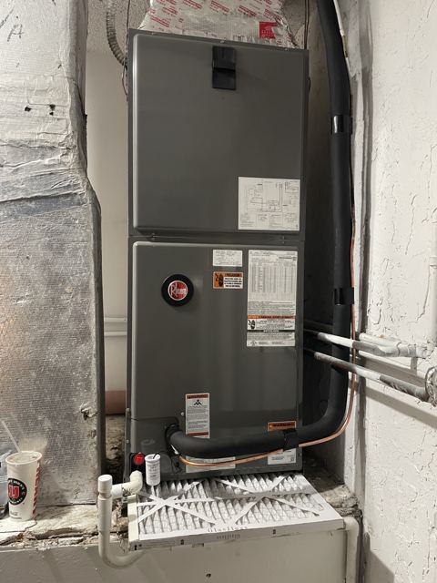 Closet install with filter base — New vertical unit, filter rack, and copper — labeled and inspection-ready (Wonder Air & Heat, Brevard County FL)