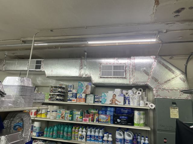 Back-of-house duct rebuild — Foil-jacketed supply trunk and plenum serving a commercial space (Wonder Air & Heat, Brevard County FL)