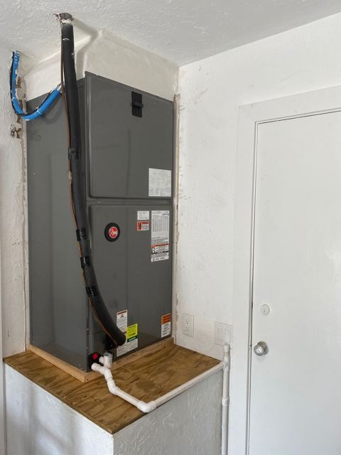 Platform install with new drain — Air handler on a rebuilt platform with brand-new condensate run (Wonder Air & Heat, Brevard County FL)